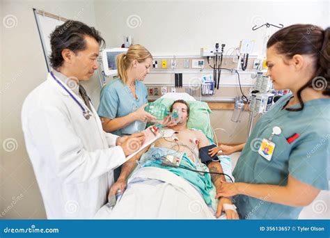 Medical Team Treating Critical Patient Stock Image Image Of Journal