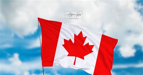 تحميل اجمل خلفية علم كندا يرفرف في السماء اجمل خلفيات كندا الرائعة