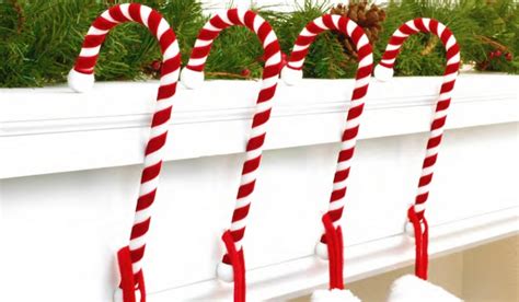 Stockings | 397.4m people have watched this. Haute Decor candy cane stocking holders. Anglo American.