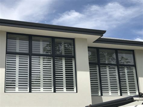 Polysatin Shutters In White Against A Black Frame Look Great From The