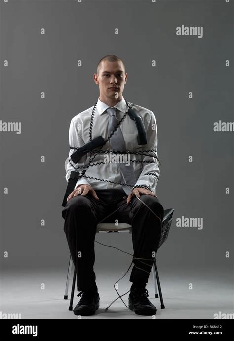 Business Man Tied Chair Hi Res Stock Photography And Images Alamy
