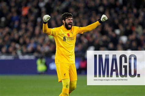 A Relieved Alisson Becker Of Liverpool During The Premier League Match Between West Ham United And