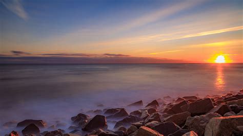 Download Wallpaper 3840x2160 Sea Stones Stone Coast Horizon Sunset