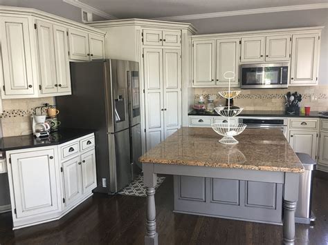 Pairing the clean look of white cabinets in our pearl finish with our deep smokey hills on the gray island, the result is a match made in finish heaven. Kitchen Remodel Glazed White Cabinets Black Granite With ...