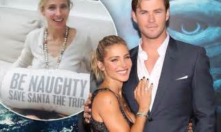 Elsa Pataky Poses With Suggestive Pillow That Says Be Naughty For