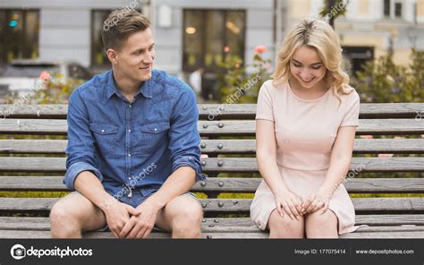 Shy Blonde Girl Smiling Attractive Guy Flirting With Beautiful Woman