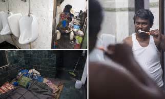 Delhi Man Who Lives Works And Eats In A Public Toilet In India For