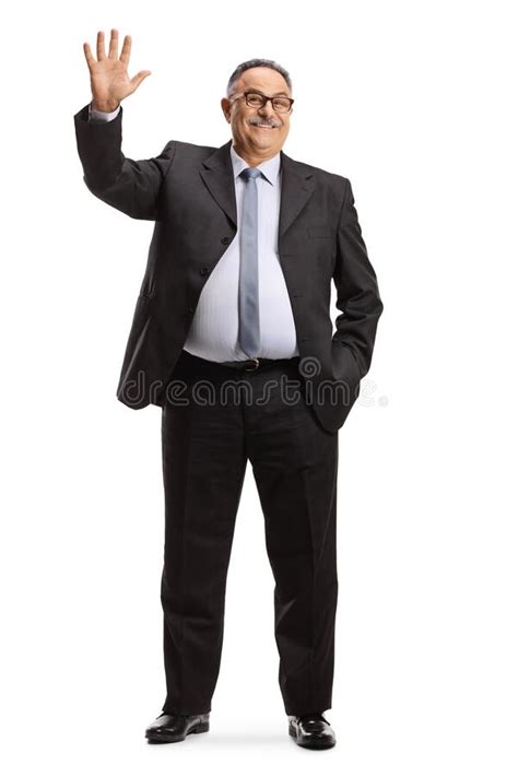 Full Length Portrait Of A Mature Businessman Waving Hello Stock Image