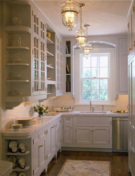 The upper wall cabinets in kitchens almost always are installed so the bottom edge of the cabinet is 54 inches above the floor. Like the feet on the lower cabinets, arch over the window ...