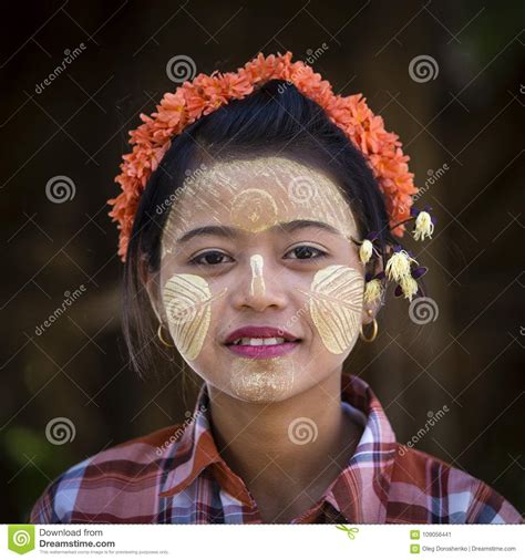 Burmese Young Girl With Thanaka Paste On Her Face In Mandalay Burma