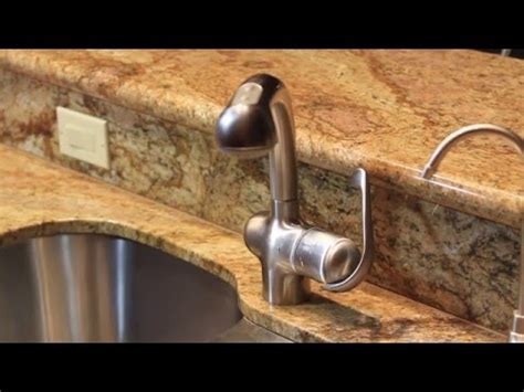 The faucet is designed to rotate, but it keeps coming loose. How to tighten Grohe Ladylux Pull Out Kitchen faucet Quick ...