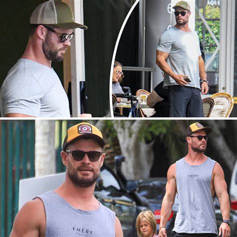 Mr Muscles Chris Hemsworth Shows Off His Bulging Biceps In A Fitted T