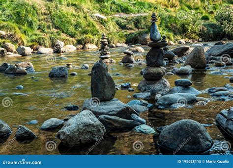 Balanced Stones Zen Rock Stacks Meditation Art In Flowing Water Of