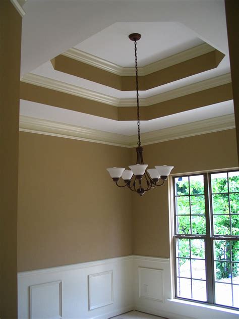 Tray ceilings aren't strictly practical: Double Tray Ceiling with crown moulding. Larger molding on ...