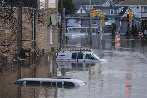 East Coast Residents Struggle With Flooding And Power Outages After