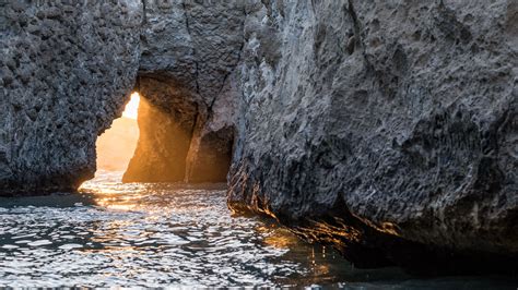 Download Wallpaper 3840x2160 Cave Rock Sunlight Water