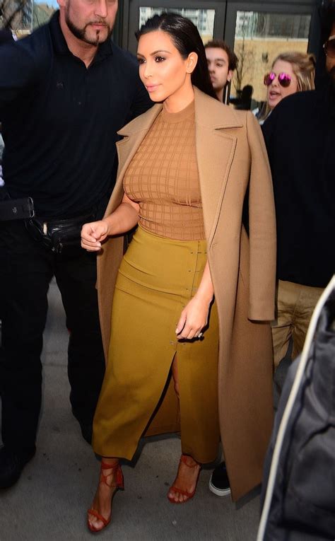 Coat Check From 35 Times Kim Kardashian Made Beige Look Sexier Than Being Nude E News