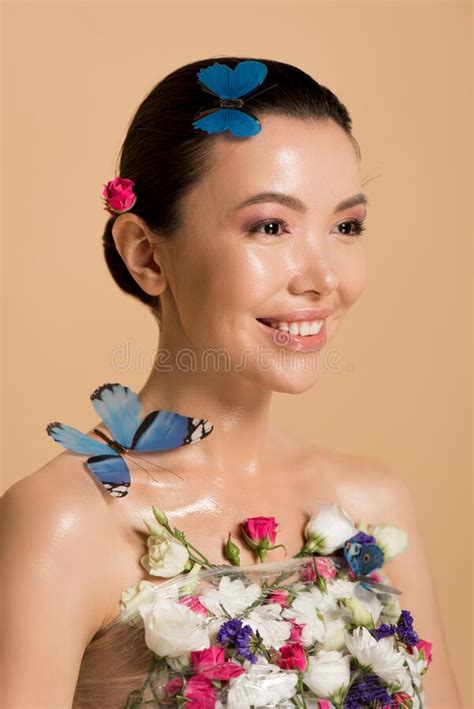 Smiling Naked Asian Girl In Flowers With Butterflies On Body Stock