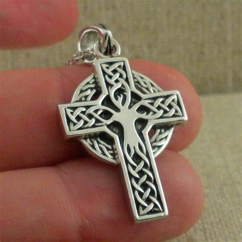 The celtic cross, considered to be a symbol of eternity, has an ambiguous history and meaning to it. Sterling Silver Tree of Life Cross Made in Ireland — Basil ...