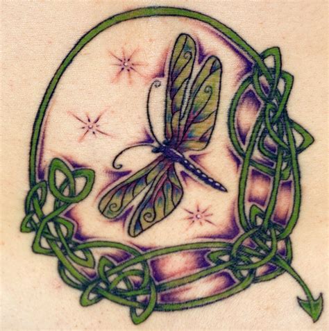 Green Celtic And Colorful Dragonfly Tattoo Idea