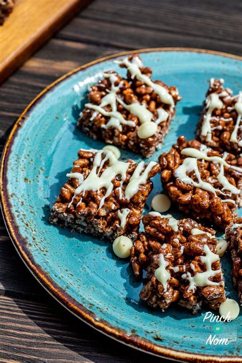 Rice crackers or rice cakes make quick and easy vegan lunch box ideas and are also healthy snacks for weight loss. Low Syn Chocolate Rice Crispy Bites | Slimming World - Pinch Of Nom | Chocolate rice crispy, Low ...