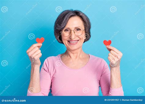 Photo Of Happy Excited Beautiful Pretty Mature Woman In Glasses Hold Little Red Paper Hearts