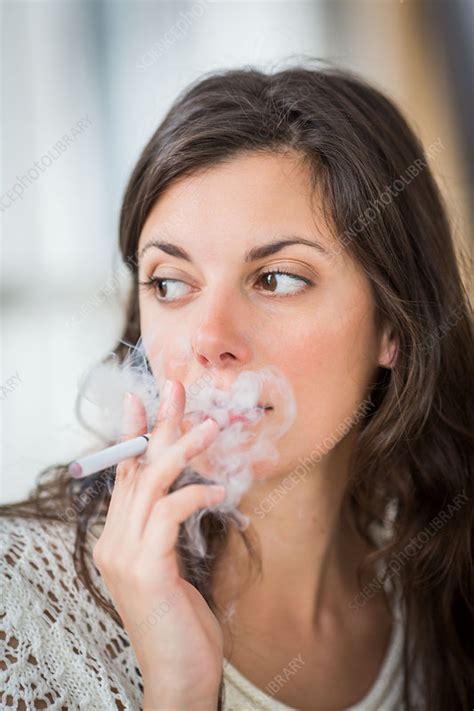 Woman Smoking Electronic Cigarette Stock Image C0341649 Science