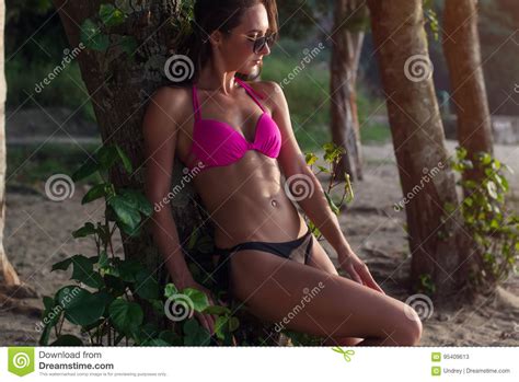 Fitness Female Brunette Model Wearing Bikini And