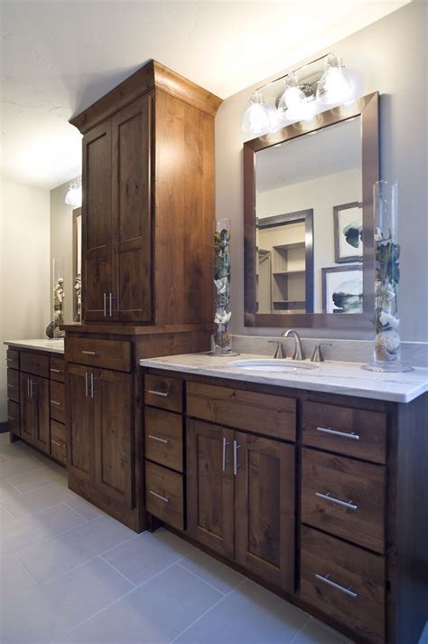 Storage space is essential for all kinds of vanities, and double sink vanities. Knotty alder vanity with a large linen tower, dual sinks ...