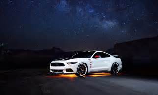 City lights wallpaper, car video game screenshot, night, futuristic city. Wallpaper : night, Ford Mustang, performance car, wheel ...