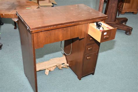 However, many old singer sewing machines do not have such a plate with the model number. 1960's walnut single pedestal sewing machine cabinet with ...