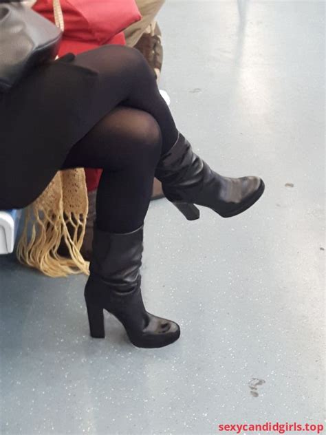 sexycandidgirls top crossed legs of a milf in a skirt black pantyhose and high heeled boots