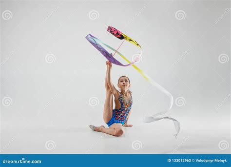 The Portrait Of Beautiful Young Brunette Woman Gymnast Training