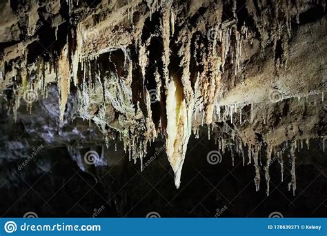 Beautiful Colorful And Illuminated Cave With Stalactites And