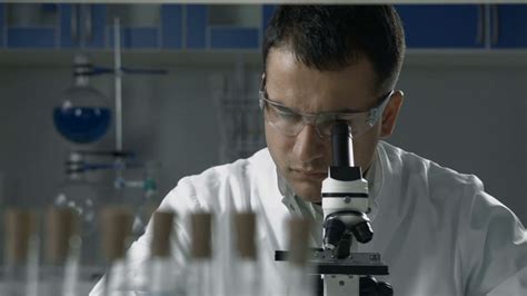 Scientific Researcher Using Microscope In The Lab Stock Video Footage