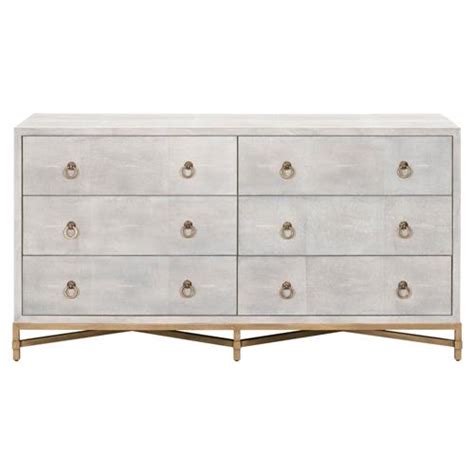 From bold, inlaid drawers to intricately handcarved wooden motifs, we have dressers and chests to suit every style or space. Simon Modern Classic 6-Drawer White Shagreen Brushed Gold Double Dresser