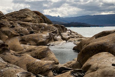 Rock Formations Near Seashore At Daytime With Cloudy Sky Hd Wallpaper