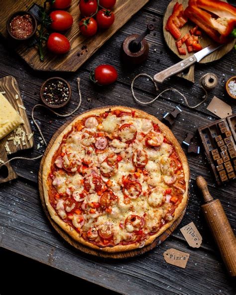 Overhead Shot Of Yummy Pizza On Rustic Dark Table Stock Image Image