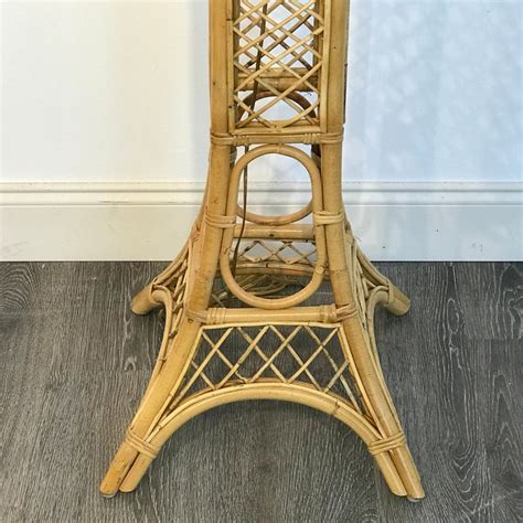 For traditionalists, classic basket weaves are a timeless choice while modernists can bring lighting into any space in unique spheres and cylinders featuring vine wraps, and with hanging rattan pendant lights. Vintage Eiffel Tower Rattan Floor Lamp For Sale at 1stdibs