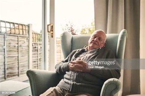 Old Man Sleeping In Chair Photos And Premium High Res Pictures Getty