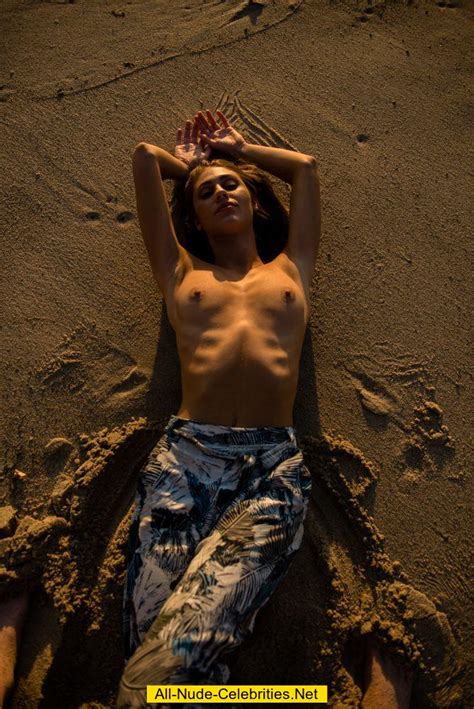 Sheridan Rhode Topless On A Beach Photoset