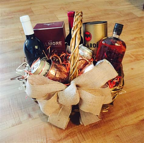 Either way, you are showing how much you care by selecting gifts just for him. Alcohol gift basket | Alcohol gift baskets, Alcohol gifts ...