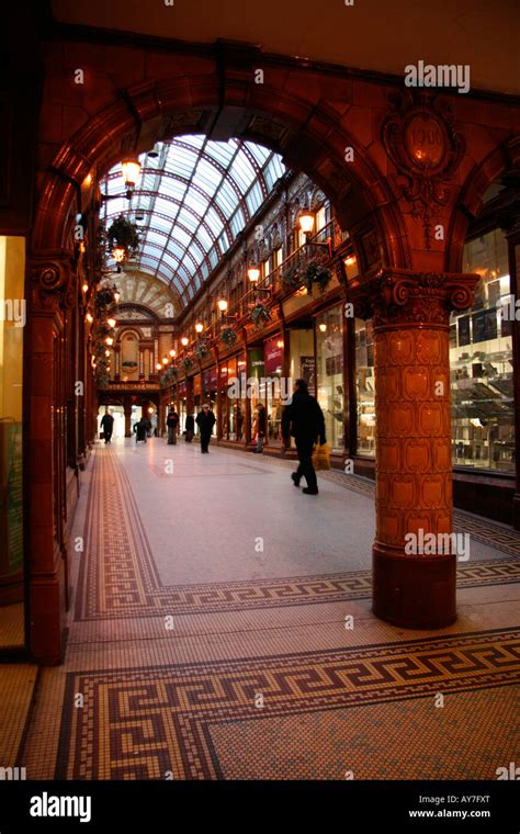 Shoppers Walk Through Newcastle Upon Tynes Central Arcade Shopping