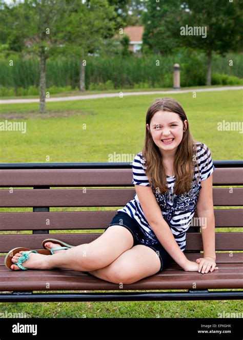 Teenage Girl Posing For A Portrait At An Outdoor Park Stock Photo Alamy
