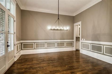 Also known as dado rail, chair rail is a type of moulding fixed horizontally to the wall around the perimeter of a room.. Amazing dining room features walls painted gray accented ...