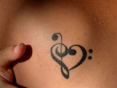 Black Heart And Music Note Tattoo Tattoomagz › Tattoo Designs Ink
