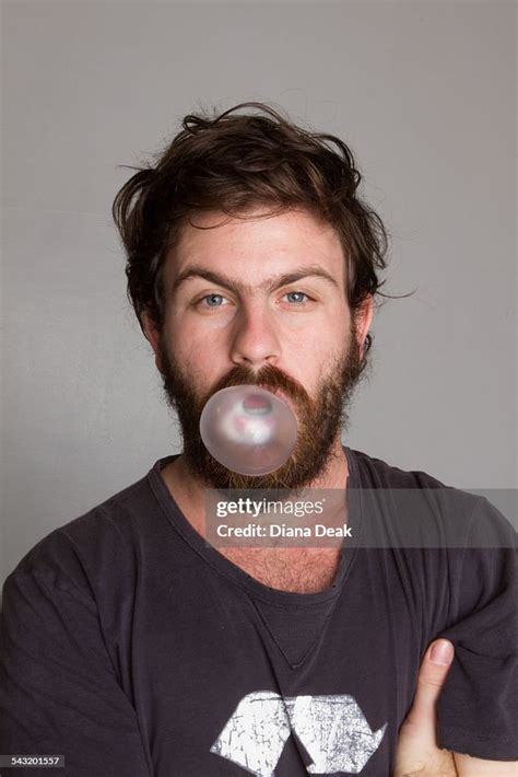 Man Blowing A Bubble Gum Bubble High Res Stock Photo Getty Images