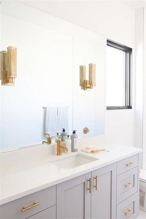 Modern kitchen, bedroom and bathroom get a touch of gold 6 photos. Light Gray Washstand with Brushed Gold Faucet ...