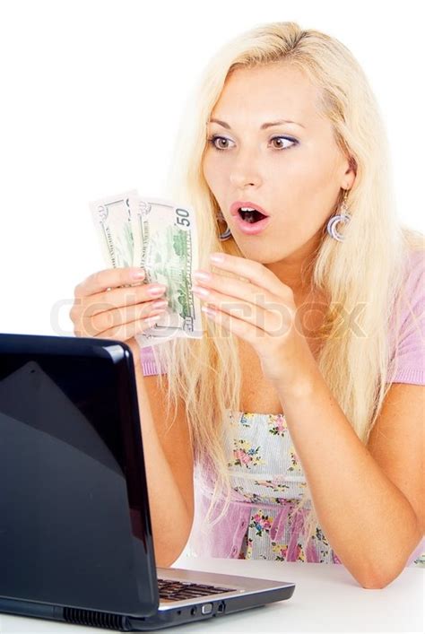 Beautiful Girl Surprised Money Sitting At A Laptop Stock