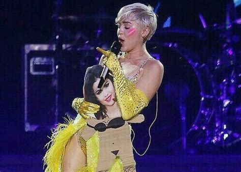 Miley Cyrus Selena Gomez Once Fought Over Nick Jonas